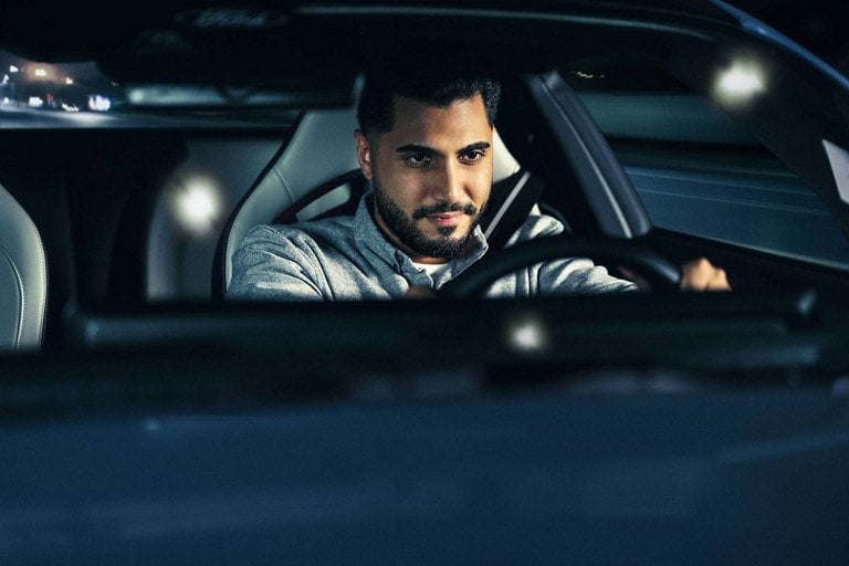 Person sitting in the driver’s seat of a parked 2024 Ford Mustang® coupe | Griffin Ford Fort Atkinson in Fort Atkinson WI
